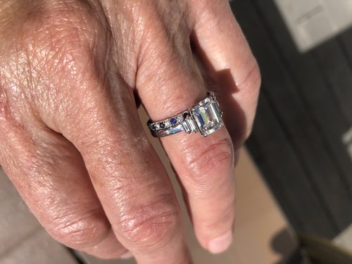 Customer photo review of Alternating Moissanite And Sapphire Eternity Wedding Band Ring