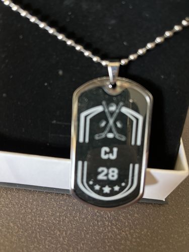 Customer photo review of Personalized Sports Dog Tags