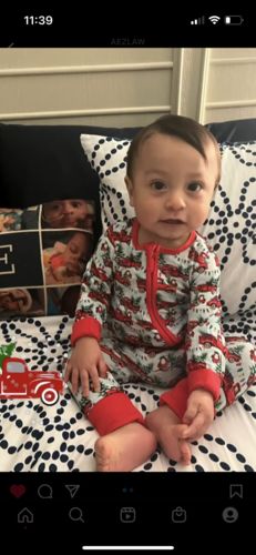 Customer photo review of We Truckin Love Christmas Convertible Footie Presale Expected Ship 11/8
