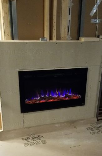 Customer photo review of Touchstone Sideline 36” Wall-Mount / Recessed Electric Fireplace