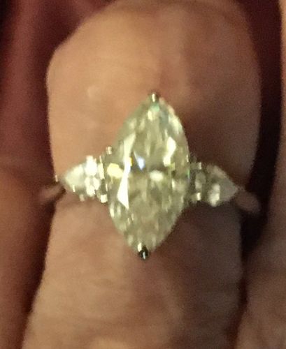 Customer photo review of Three Stone Marquise-Cut Moissanite Pear-Cut Side Stone Engagement Ring