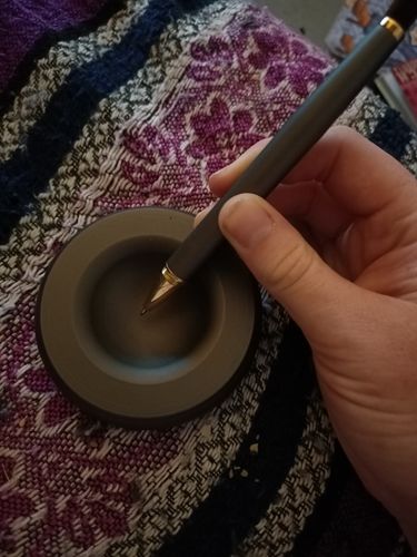 Customer photo review of Magic Metal Fidget Pen with Base with BONUS FREE REFILL ink
