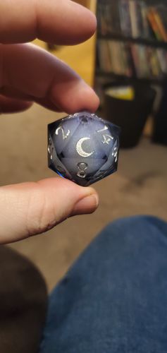 Customer photo review of Liquid Core Sharp Edge Resin DnD Dice Set Dark Blue Moon Dice