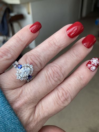 Customer photo review of Halo Oval Moissanite Pear Sapphire Sidestone Pave Engagement Ring