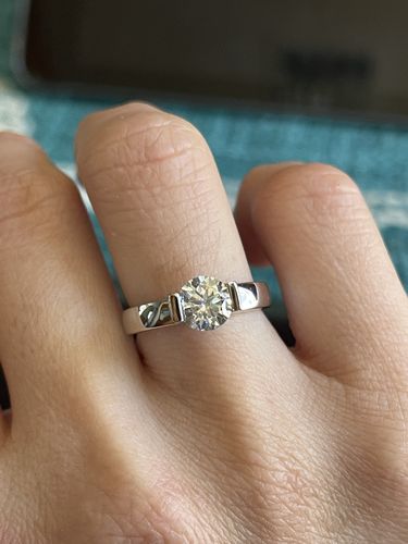 Customer photo review of Solitaire Moissanite Half Bezel Set Engagement Ring In Sterling Silver