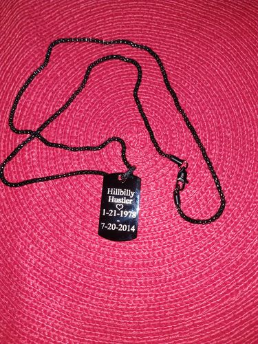 Customer photo review of Engravable Detailed Dog Tag