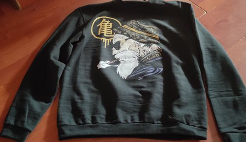 Customer photo review of SUDADERA DRAGON BALL pregunta por el diseño que más te guste.