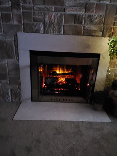 Customer photo review of Napoleon Woodland 24'' Electric Fireplace Log Insert