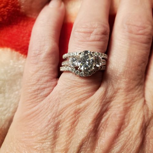 Customer photo review of Three Stone Oval Moissanite Channel-Set Engagement Ring