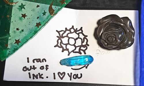 Customer photo review of Silver Sheen Obsidian Flower
