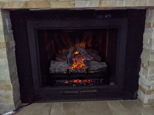 Customer photo review of Napoleon Woodland 24'' Electric Fireplace Log Insert