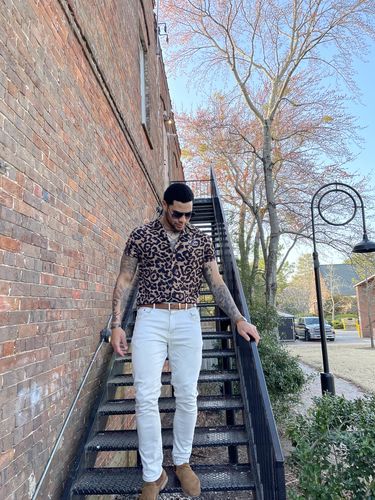 Customer photo review of Salty Savage™ Unisex OG Smile Beach Button Down Shirt | Leopard Print