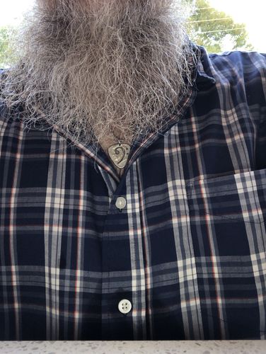 Customer photo review of Bass Clef Guitar Pick Necklace, Cut and Burnished From a Quarter, Hand Cut Coin