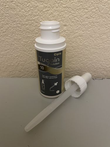Customer photo review of Tugain 10% Minoxidil Extra Strength Topical Solution for Men.