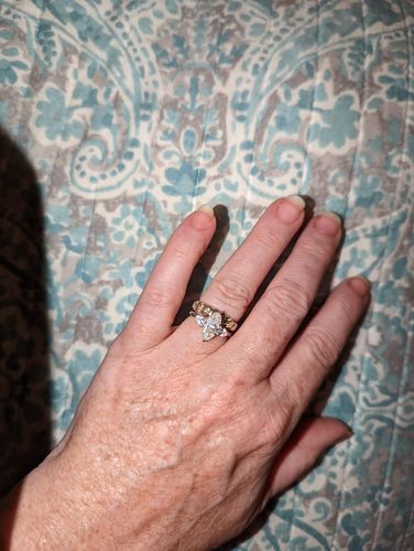 Customer photo review of Three Stone Marquise-Cut Moissanite Pear-Cut Side Stone Engagement Ring