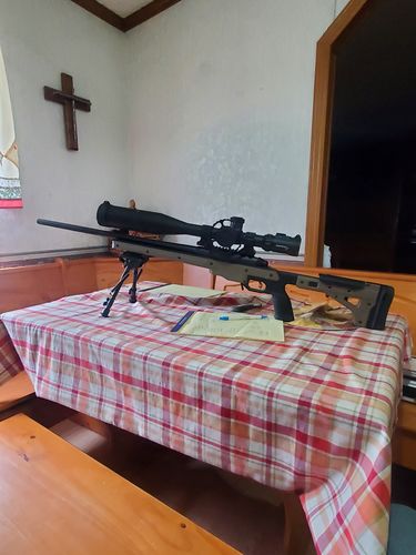 Customer photo review of Sniper KT 12-60X60 SAL Rifle Scope 35mm Tube Side Parallax Adjustment Glass Etched Reticle Red Green Illuminated with Scope Rings