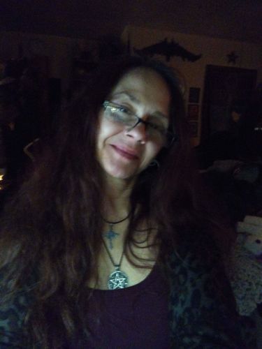 Customer photo review of The Spell Casters Pendant