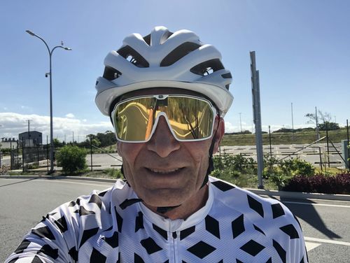 Customer photo review of Spinshield White Fade (slight mark on frame) with Green/Red Arms Multi Laser Gold Lens