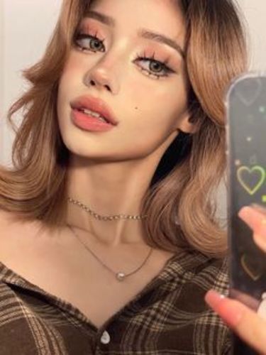 Customer photo review of EYEVOS Himalaya Brown Colored Contact Lenses