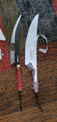 Customer photo review of Amber Nichirin Blade Twin Sword in Just $121 (Japanese Steel is Available) of Tengen Uzui from Demon Slayer | Japanese Samurai Sword