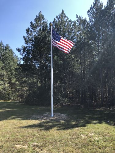 Customer photo review of 25 ft. Commercial Flagpole with External Rope Halyard Rated At 120+ mph