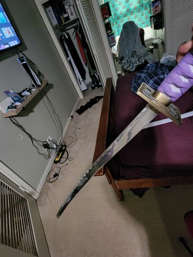 Customer photo review of Senbonzakura Katana Sword of Kuchiki Byakuya in $88 (Japanese Steel Available) Zanpakuto from Bleach-Purple & White | Bleach Katana | Zanpakuto Katana