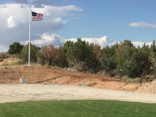 Customer photo review of 25 ft. Commercial Flagpole with External Rope Halyard Rated At 105 mph