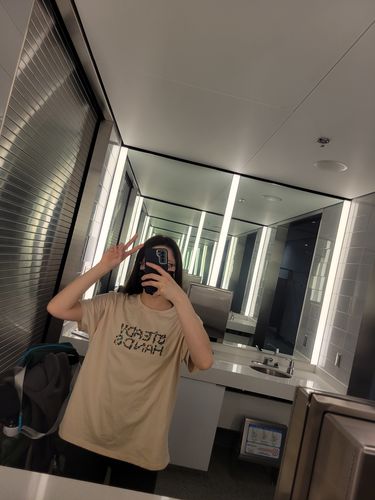 Customer photo review of Floral Hands Tee