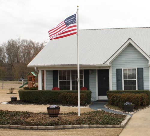 Customer photo review of 15 FT. Commercial Aluminum Flagpole with External Rope Halyard Rated At 120 mph