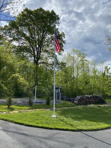 Customer photo review of 20 ft. Commercial Aluminum Flagpole with External Rope Halyard rated at 85mph