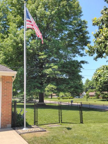 Customer photo review of 20 ft. Commercial Aluminum Flagpole with External Rope Halyard rated at 85mph