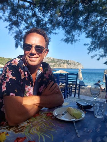 Customer photo review of Men's Pink Flower Print Pocket Short Sleeve Hawaiian Shirt