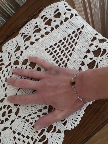 Customer photo review of Bracelet à perle d'oeil de tigre et sa chaîne en acier chirurgical