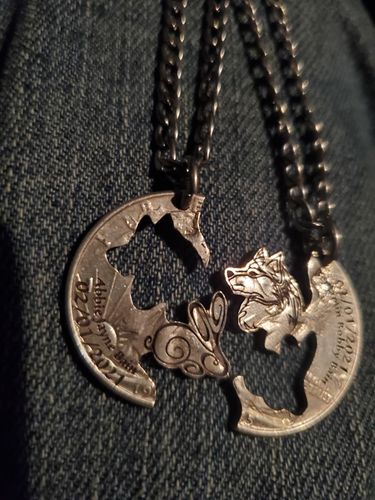 Customer photo review of Wolf and Bunny Necklaces with Engraved Custom Names and Dates