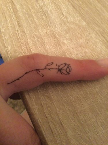 Customer photo review of Rose Finger Tattoo