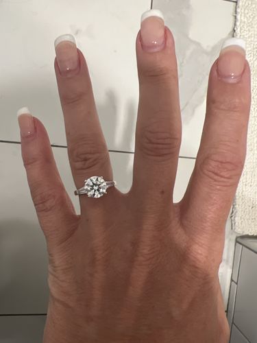 Customer photo review of Three Stone Round Moissanite Tapered Baguette Engagement Ring