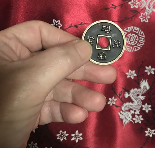Customer photo review of Chinese Coin (Black - Ike Dollar Size) by Royal Magic