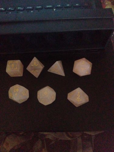 Customer photo review of Rose Quartz DnD Dice Set Axolotl Fuck Dice