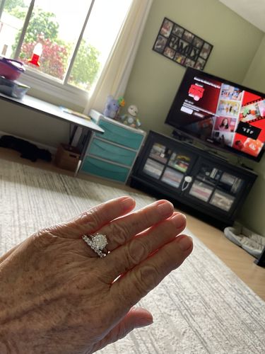 Customer photo review of Classic Solitaire Moissanite Six-Prong Sterling Silver Ring