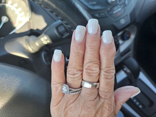 Customer photo review of Moissanite Round Half Eternity Sterling Silver Wedding Band Stackable Ring