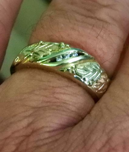 Amber W. review of Mens Black Hills Gold Triple Diamond Ring image 1 out of 1