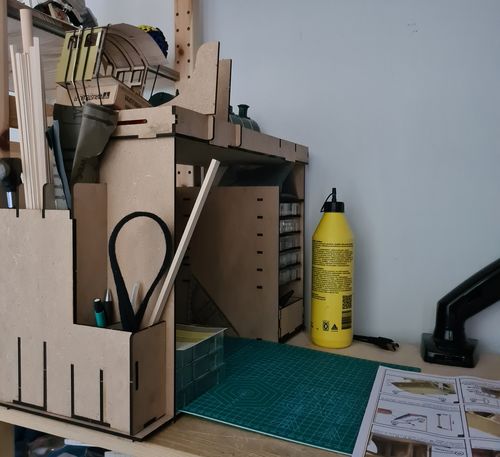 Reseña con foto de un cliente sobre Mueble taller organizador