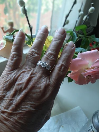 Customer photo review of Classic Three Stone Round Cut Moissanite Sterling Silver Wedding Ring