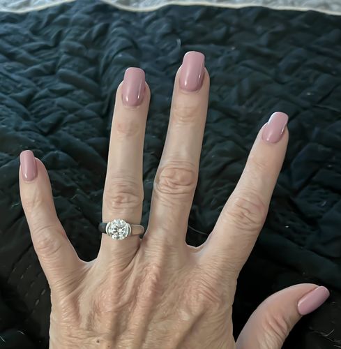 Customer photo review of Solitaire Moissanite Half Bezel Set Sterling Silver Engagement Ring