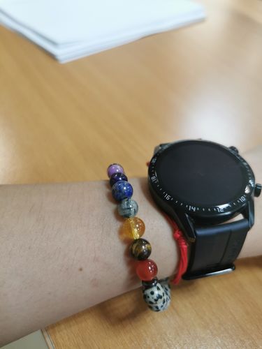 Customer photo review of Pulsera Ónix y Jaspe Dálmata con 7 Chakras (8 mm)