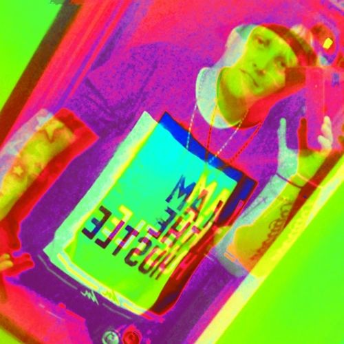 Customer photo review of I Am The Hustle Flag - Black Shirt