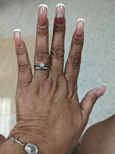 Customer photo review of Classic Solitaire Moissanite Six-Prong Sterling Silver Ring