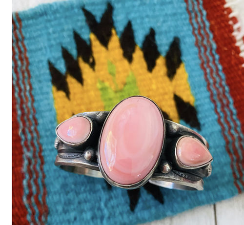 Customer photo review of Navajo Queen Pink Conch Shell & Sterling Silver Cuff Bracelet By Chimney Butte