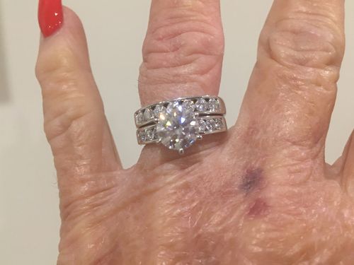 Customer photo review of Channel Set Moissanite Half Eternity Wedding Band Ring In Sterling Silver