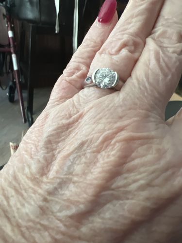 Customer photo review of Solitaire Moissanite Half Bezel Set Sterling Silver Engagement Ring